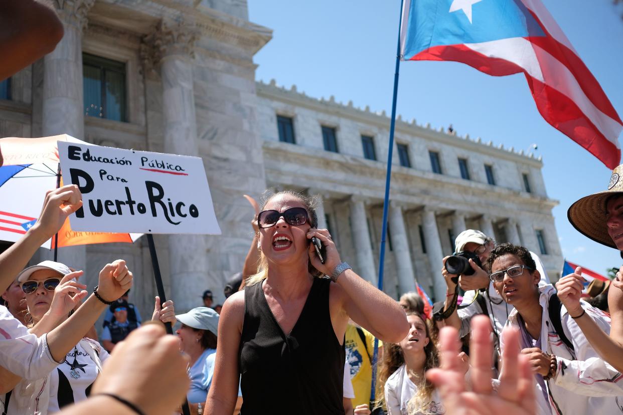 Teachers participate in a one-day strike against the government's privatization drive in public education in San Juan, Puerto Rico, on March 19. (Photo: RICARDO ARDUENGO via Getty Images)