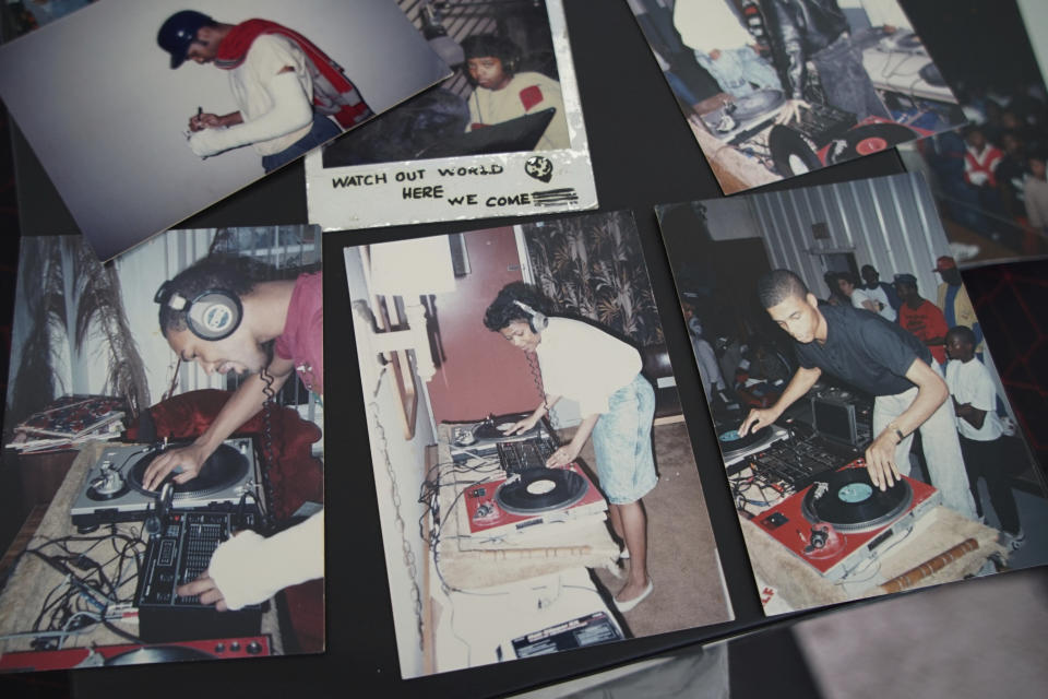 Old photos of Alton Lucas, top and bottom on left, and musician DJ Nabs, lower right, are assembled in a scrapbook in Nabs' home studio outside of Raleigh, N.C., on Saturday, June 26, 2021. As a teenager, Lucas believed basketball or music would pluck him out of North Carolina and take him around the world. In the late 1980s, he was already the right-hand man to his musically inclined best friend, Youtha Anthony Fowler, who many hip-hop and R&B heads know today as DJ Nabs. (AP Photo/Allen G. Breed)