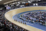 Cyclists compete in the Women's Keirin Qualifying Race in the UCI Track Cycling World Cup at the Olympic Velodrome in London February 19, 2012. REUTERS/Cathal McNaughton