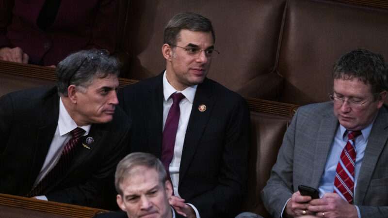 Former congressman Justin Amash, center, on the House floor in January 2023 with Reps. Andrew Clyde, R-Ga., left, Thomas Massie, R-Ky., right, and Jim Jordan, R-Ohio.