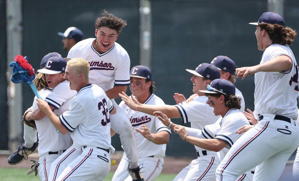 Crimson Cliffs celebrates their win over Snow Canyon in the 4A state championship at UVU in Orem on Saturday, May 20, 2023. | Jeffrey D. Allred, Deseret News