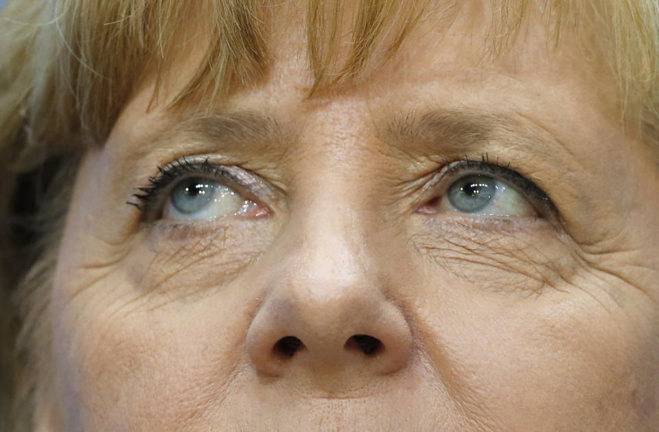 German Chancellor and leader of the Christian Democratic Union ( CDU) Angela Merkel holds a news conference after a CDU party board meeting in Berlin September 23, 2013, the day after the general election. Merkel faces the daunting prospect of persuading her centre-left rivals to keep her in power after her conservatives notched up their best election result in more than two decades but fell short of an absolute majority. (REUTERS/Fabrizio Bensch)