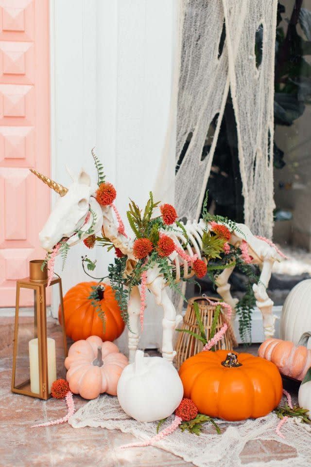 <p>How fun is this front porch Halloween decor? <a href="https://sugarandcloth.com/halloween-door-decor-3-not-so-spooky-front-door-decor-ideas/" rel="nofollow noopener" target="_blank" data-ylk="slk:Sugar and Cloth;elm:context_link;itc:0;sec:content-canvas" class="link ">Sugar and Cloth</a> spiced up a store-bought skeleton with seasonal florals, greenery, and a gold unicorn horn for a more whimsical as opposed to scary Halloween decor. </p><p><a class="link " href="https://www.target.com/p/halloween-sonic-realistic-skeleton-cat/-/A-51199708" rel="nofollow noopener" target="_blank" data-ylk="slk:BUY NOW;elm:context_link;itc:0;sec:content-canvas">BUY NOW</a> <strong><em>Skeleton Cat, $17</em></strong></p>