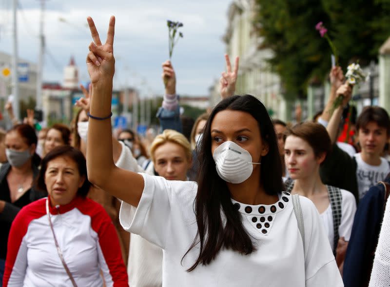 Women take part in a demonstration against police violence in Minsk