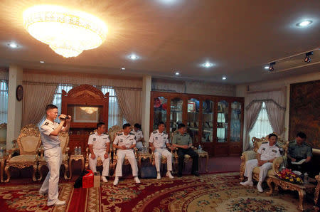 Captain Wang Hong Li (2nd R), Commanding Officer of the 23rd Chinese Naval Escort Task Force, attends a meeting with Cambodia's Defense Minister Tea Banh at the Ministry of National Defense of Cambodia, in Phnom Penh, Cambodia October 17, 2016. REUTERS/Samrang Pring