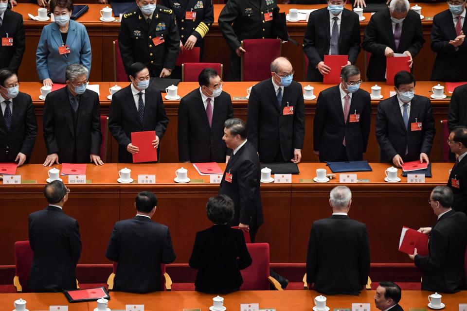 <span>Xi Jinping se retira tras la sesión de clausura de la Asamblea Popular Nacional en el Gran Salón del Pueblo de Pekín, el 11 de marzo de 2022</span><div><span>Leo RAMIREZ</span><span>AFP</span></div>