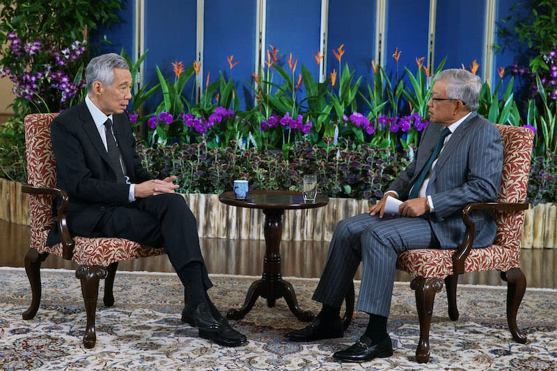 Prime Minister Lee Hsien Loong with Ho Meng Kit, CEO of the Singapore Business Federation, at the recording for the APEC CEO Dialogues 2020 