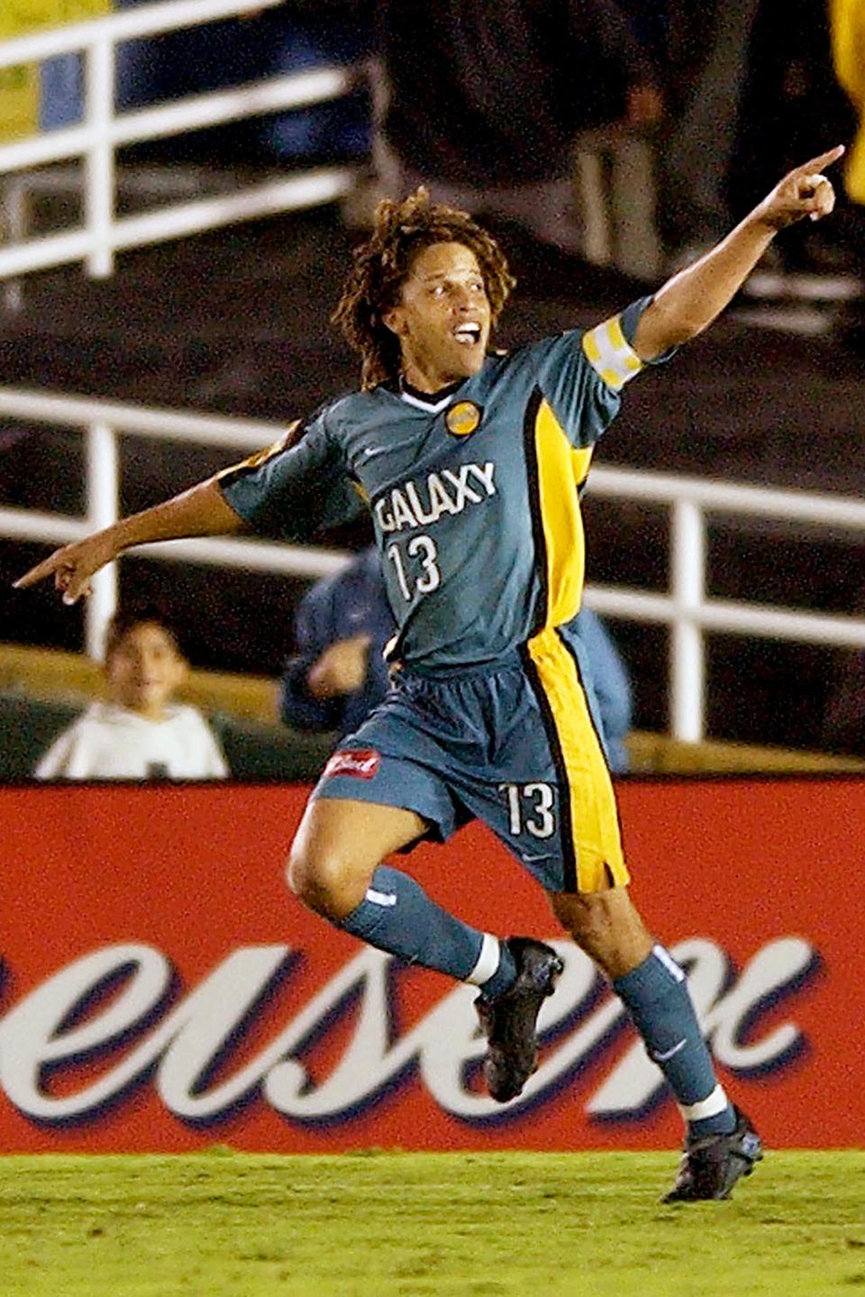 Los Angeles Galaxy forward Cobi Jones celebrates his goal against the Kansas City Wizards during the 2002 playoffs.