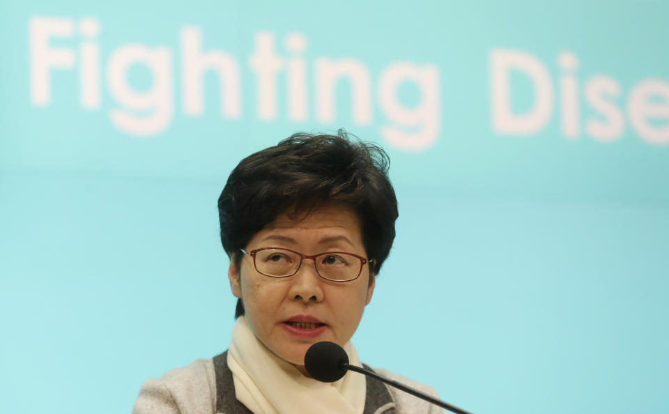Hong Kong Chief Executive Carrie Lam speaks during a press conference held in Hong Kong Saturday, Jan. 25, 2020. The virus-hit Chinese city of Wuhan, already on lockdown, banned most vehicle use downtown and Hong Kong said it would close schools for two weeks as authorities scrambled Saturday to stop the spread of an illness that has infected more than 1,200 people and killed 41. (AP Photo/Achmad Ibrahim)