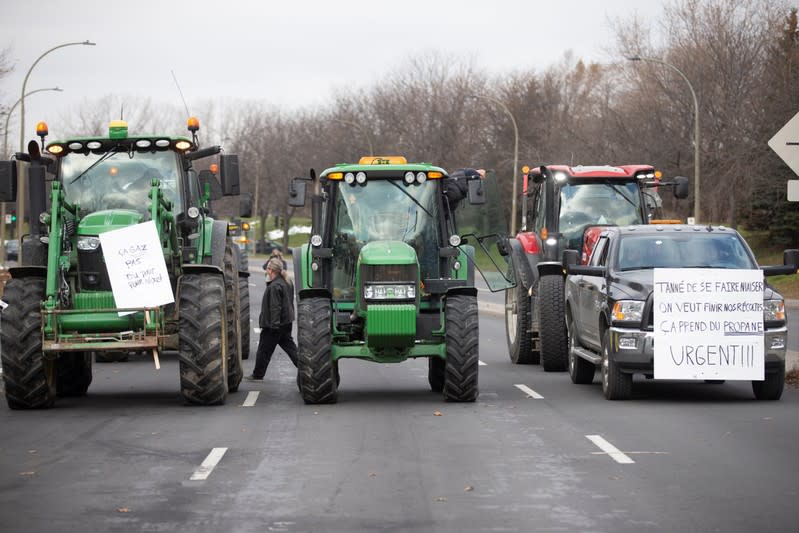 Farmers in tractors take to the streets protest the lack of propane due to the CN Rail strike in Montreal