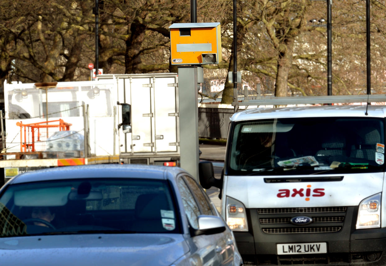 A fixed speed camera on the central reservation at the 30 miles per hour limit, on Millbank in Westminster central London.