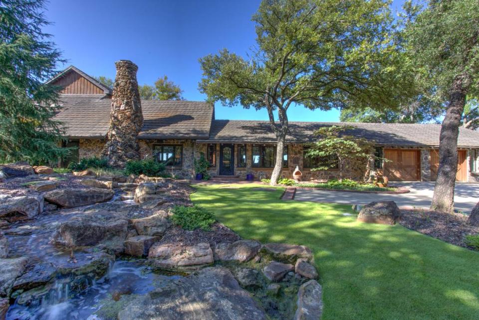 This home on 8935 Dickson Rd. was once occupied by Elton Hyder, a Texas lawyer who prosecuted Japanese war crimes after World War II. It has one-of-a-kind design features such as grasscloth wallpaper and a stone fireplace. It is on the market for $3.35 million.