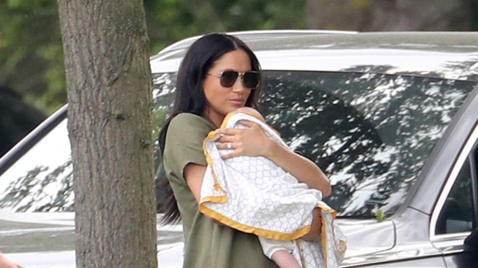 Meghan Markle holds baby Archie