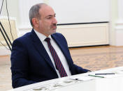 Armenian Prime Minister Nikol Pashinyan attends a meeting with Russian President Vladimir Putin and Azerbaijan's President Ilham Aliyev in Kremlin in Moscow, Russia, Monday, Jan. 11, 2021. Russian President Vladimir Putin on Monday hosted his counterparts from Armenia and Azerbaijan, their first meeting since a Russia-brokered truce ended six weeks of fighting over Nagorno-Karabakh. (Mikhail Klimentyev, Sputnik, Kremlin Pool Photo via AP)