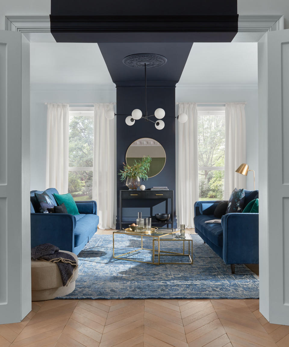 <p> When thinking about feature walls for the lounge, we typically think of them surrounding a fireplace or being used as a backdrop for the best TV in the home. But rather than creating a statement on the back wall, why not make use of your fifth wall?&#xA0; </p> <p> A living room ceiling idea like this is one way to draw the eye up (which is perfect if you have high ceilings or will distract from a small living room). </p>