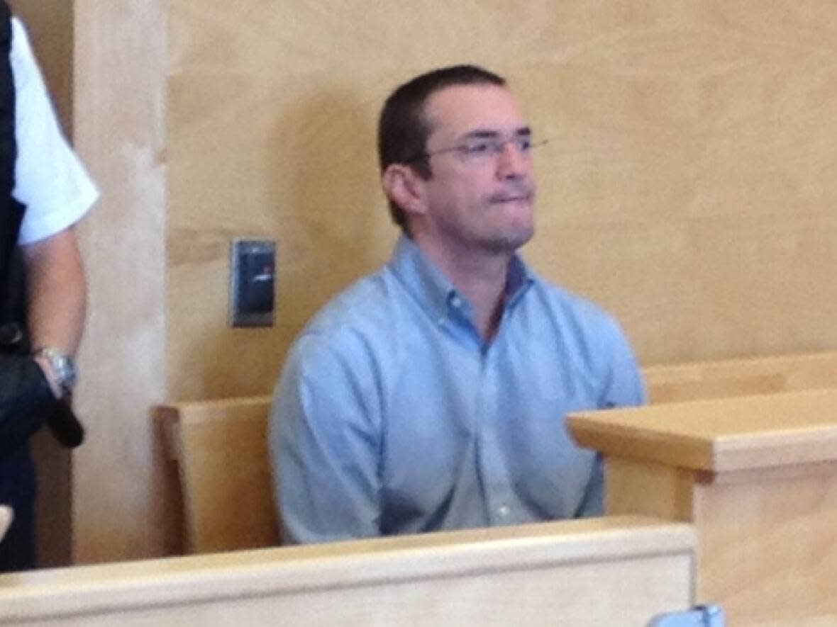 Donnie Snook, pictured here in a Corner Brook, N.L., courtroom on Aug. 20, 2013, is serving an 18-year prison sentence after pleading guilty in 2013 to 46 child exploitation-related charges in Saint John. (CBC - image credit)