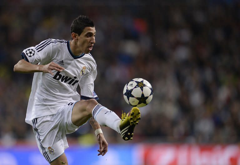 Real Madrid's Argentinian midfielder Angel Di Maria controls the ball during his side's Champions League quarter-final first leg against Galatasaray at Santiago Bernabeu stadium in Madrid on April 3, 2013. Di Maria has insisted Real Madrid have learnt from their group stage defeat at Borussia Dortmund and will not make the same mistake twice in Wednesday's Champions League semi-final, first-leg