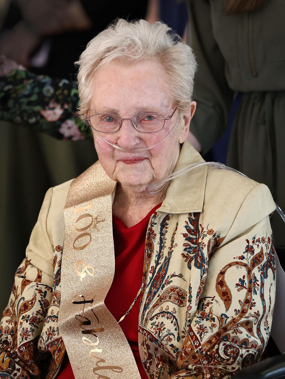 Elizabeth "Betty" Beecher celebrates her 100th birthday at Fairing Way retirement community in Weymouth on Monday April 15, 2024. Beecher is a retired public health nurse and former U.S. Cadet Nurse during World War II.