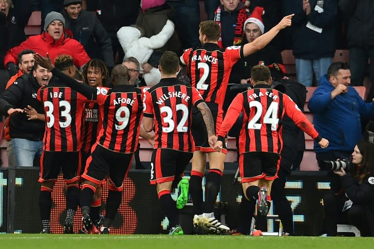 Bournemouth celebrate their fourth goal, which sealed a 4-3 win against Liverpool in Bournemouth on December 4, 2016