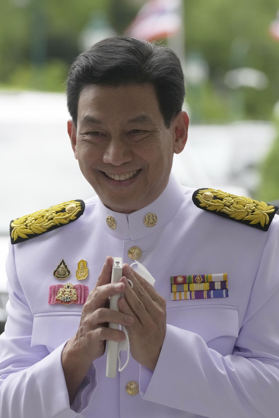 Thailand's Foreign Minister Parnpree Bahiddha-Nukara arrives at the government house in Bangkok, Thailand, Tuesday, Sept. 5, 2023. Thailand's Prime Minister Srettha Thavisin on Tuesday led his cabinet members to take oath in front of Thailand's King Maha Vajiralongkorn. (AP Photo/Sakchai Lalit)