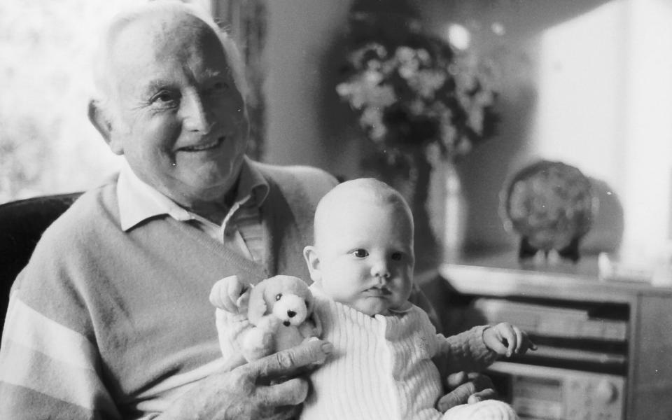 Michael’s father Eric Dobbs with his grandson Will – Michael says ‘it was that silence that killed my father’ - Jay Williams for The Telegraph