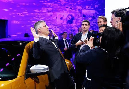 Michael Horn, President and CEO of Volkswagen America, reacts to being mobbed by the media after he apologized for the Volkswagen diesel scandal at the LA Auto Show in Los Angeles, California, United States in a November 18, 2015 file photo. REUTERS/Lucy Nicholson/Files