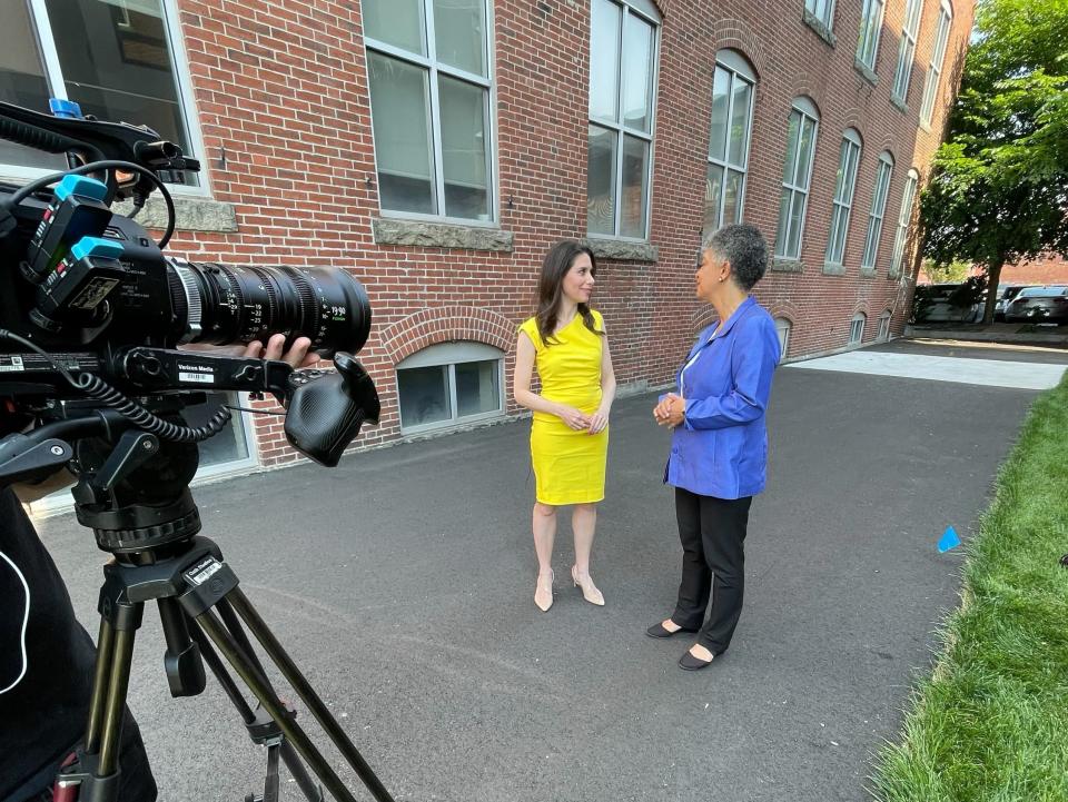 Boston Fed president Susan Collins, right, in Lawrence, Mass., with Yahoo Finance's Jennifer Schonberger, left.