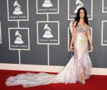 <p>La chanteuse de <i>Teenage Dream</i> a tout simplement réalisé notre rêve de devenir une sirène grâce à cette tenue lors des Grammys 2011. [<i>Photo : Getty</i>]</p>