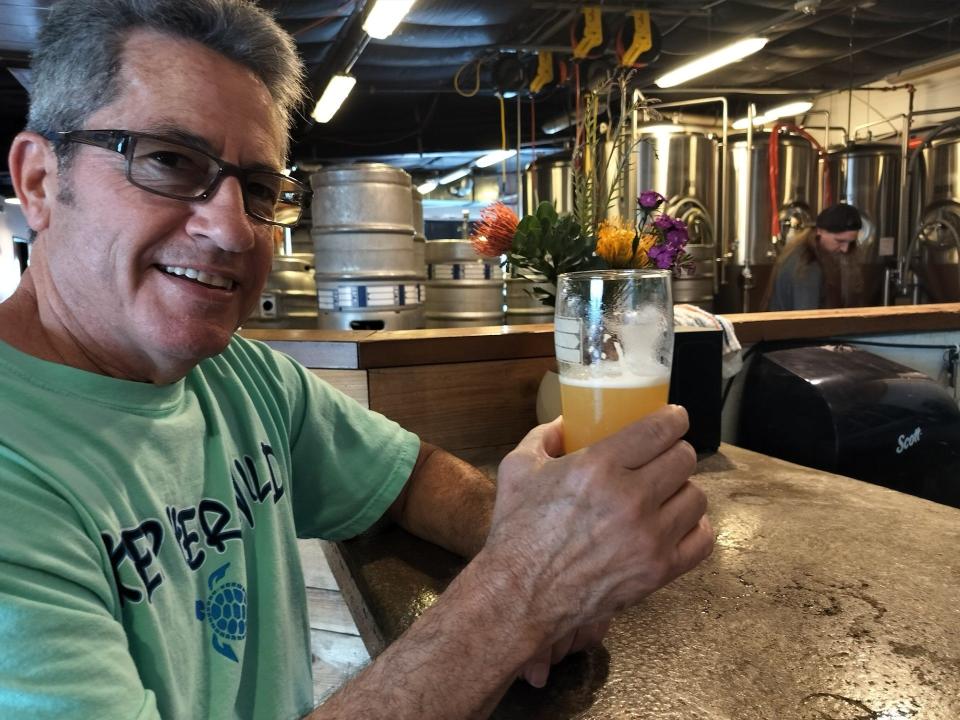 Wendell England is a regular at St. Elmo Brewing Co., in part of the St. Elmo Arts District known as the Yard. England lives nearby and has been walking to the locally owned brewery since it opened in 2016.