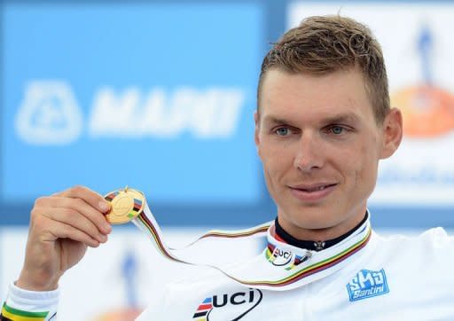 German cyclist Tony Martin celebrates after winning the world time-trial title in Valkenburg, the Netherlands