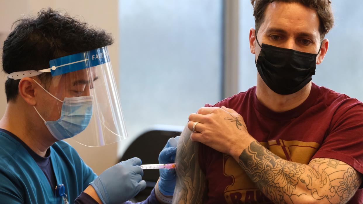 An FDNY Registered Nurse (RN) administers a dose of the Moderna COVID-19 vaccine to an FDNY Certified First Responder (CFR) Firefighter at the Fire Department Headquarters in Brooklyn on Tuesday, Dec. 29, 2020. The Department can vaccinate up to 450 members per day at the three locations combined. Vaccinations are not mandatory but are strongly encouraged. Since the start of the pandemic, the Department has lost 12 members to COVID-19, including five members of EMS and seven civilians.