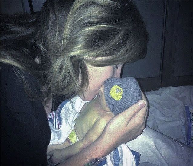 Abbey couldn't stop kissing her baby enough. Picture: Supplied