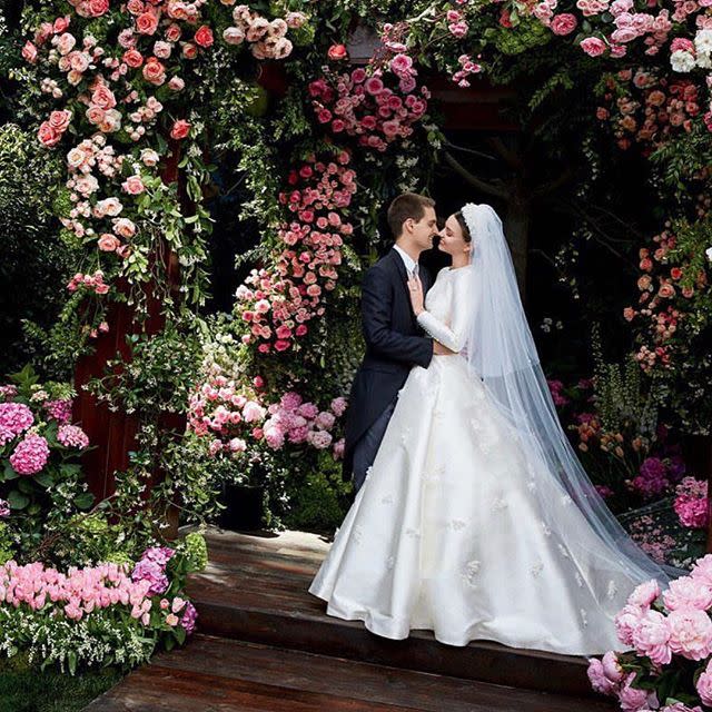 <p>The former VS Angel wed the Snapchat co-founder at their Los Angeles home a couple of weeks ago in an intimate, 45-person ceremony. The bride and groom wore custom Dior, photographs were snapped by famed photographer Patrick Demarchelier and Kerr worked directly with Dior designer Maria Grazia Chiuri on her <a rel="nofollow noopener" href="http://www.harpersbazaar.co.uk/bazaar-brides/news/a42720/first-look-at-miranda-kerrs-beautiful-dior-wedding-dress/" target="_blank" data-ylk="slk:Grace Kelly-inspired bridal gown;elm:context_link;itc:0;sec:content-canvas" class="link ">Grace Kelly-inspired bridal gown</a>, which she showed off, along with some sweet moments with Spiegel, on her feed. </p>