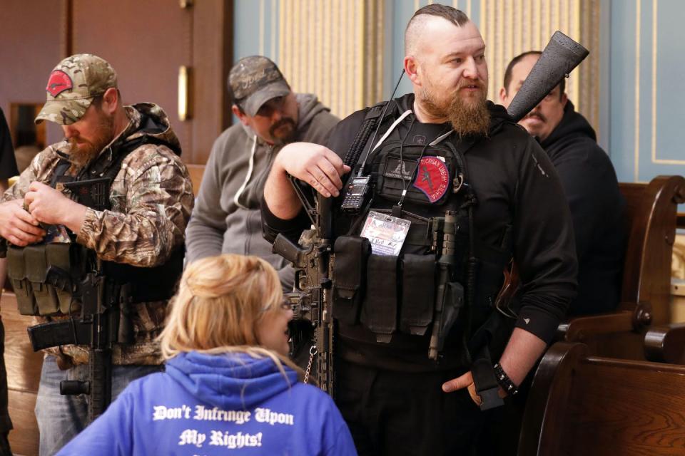 William Null at a statehouse protest in Michigan.