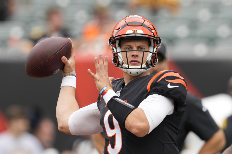 Cincinnati Bengals quarterback Joe Burrow (9) throws before an NFL football game against the Pittsburgh Steelers, Sunday, Sept. 11, 2022, in Cincinnati. (AP Photo/Jeff Dean)