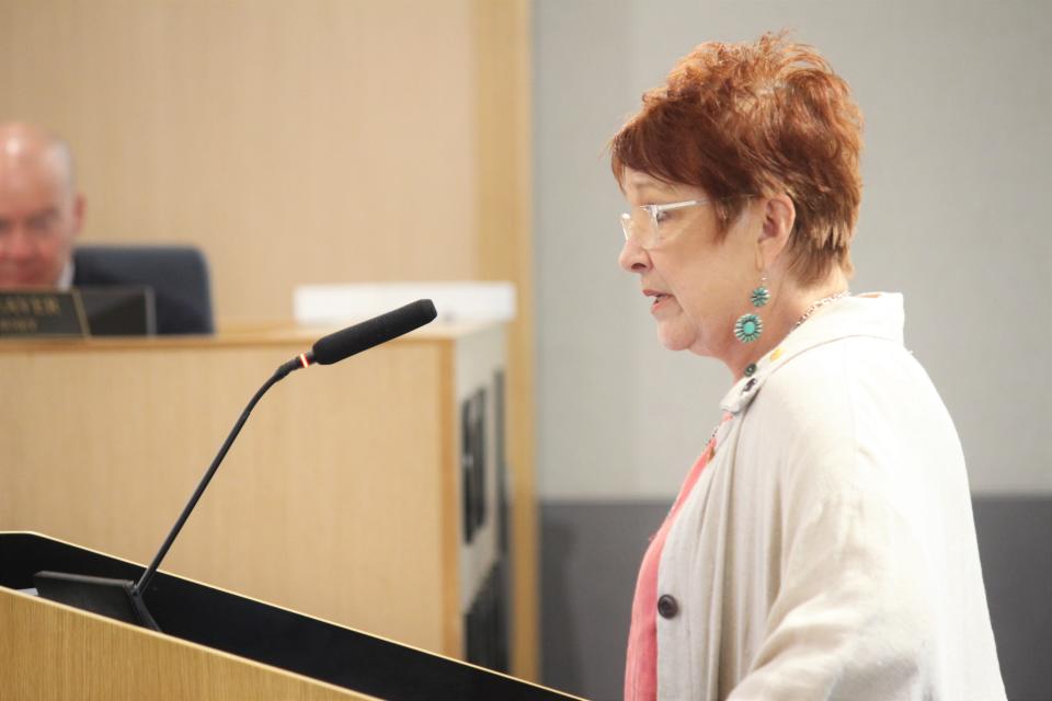South Overton resident Tonja Hagy-Valdine speaks in opposition to a zone change to build a large student housing complex at a Lubbock City Council meeting Tuesday.