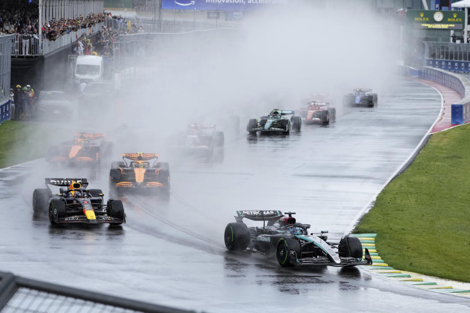 Mercedes driver George Russell, of the United Kingdom, leads as Red Bull driver Max Verstappen, left, of Belgium and Netherlands, drives during the Canadian Grand Prix Formula 1 car race, in Montreal, Sunday, June 9, 2024. (Christinne Muschi/The Canadian Press via AP)