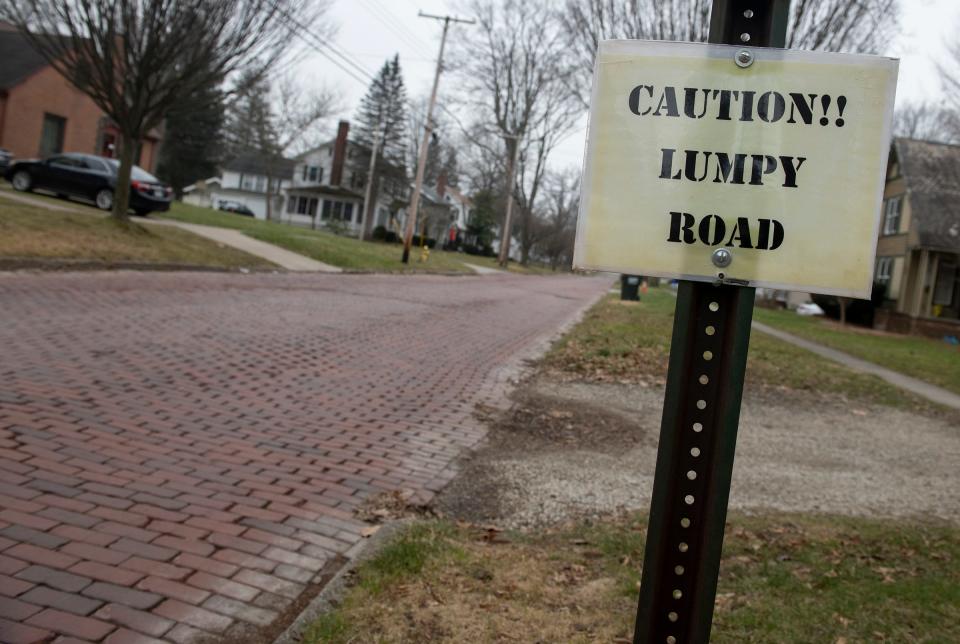 The replacement of bricks on South Freedom Street is among Ravenna's plans to pave 14 miles of streets in 2023 and early 2024.
