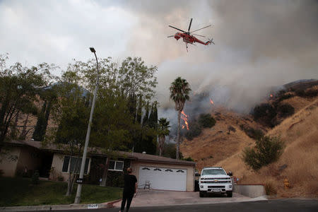 The La Tuna Canyon fire over Burbank, California, September 2, 2017. REUTERS/Kyle Grillot