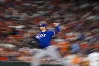 Texas Rangers starting pitcher Jordan Montgomery throws during the seventh inning of Game 1 of the baseball AL Championship Series against the Houston Astros Sunday, Oct. 15, 2023, in Houston. (AP Photo/David J. Phillip)