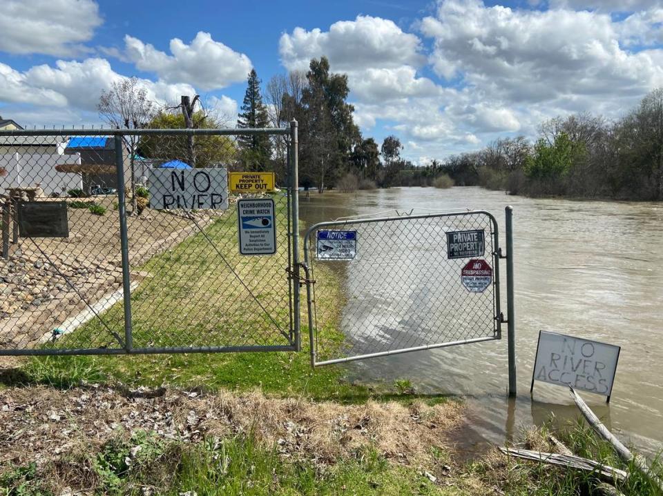 Rising levels of the San Joaquin River approach the backyards of Wildwood Mobile Home Park residences on March 20, 2023. On this day, discharge levels from Friant Dam measured 8,250 cfs. The mobile home park is located near 41 on the Madera County side.