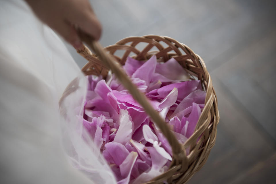 Little Flower Girls Tossing Rose Petals During Wedding Ceremony