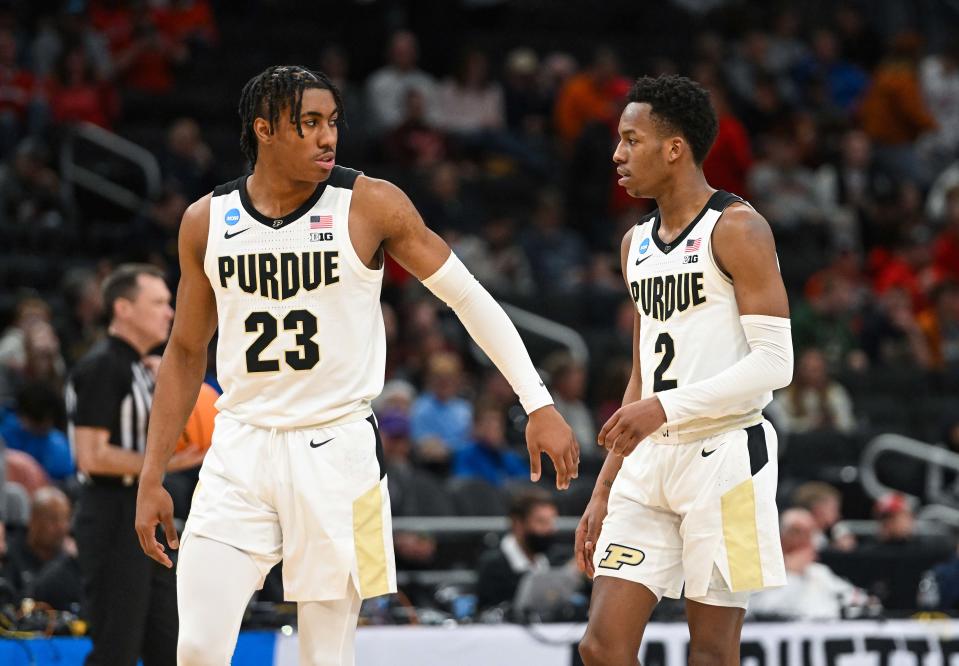Mar 18, 2022; Milwaukee, WI, USA; Purdue Boilermakers guard Jaden Ivey (23) talks with guard Eric Hunter Jr. (2) during the second half against the Yale Bulldogs in the first round of the 2022 NCAA Tournament at Fiserv Forum. Mandatory Credit: Benny Sieu-USA TODAY Sports
