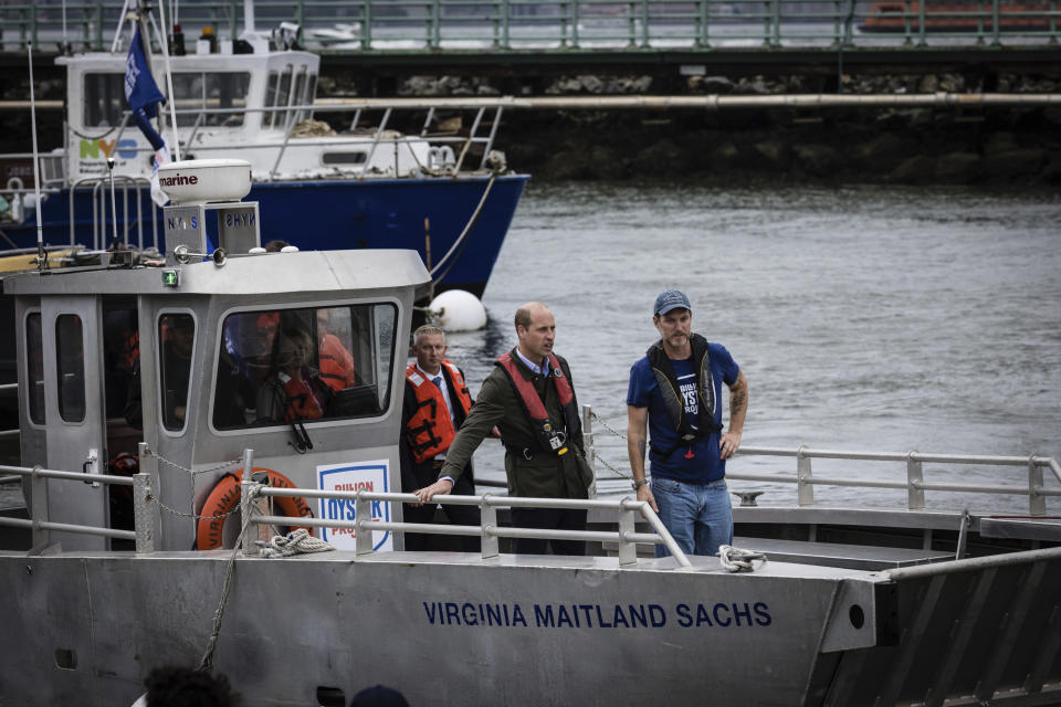 Britain's Prince William, Prince of Wales travels by boat to meet students working on the Billion Oyster Project on Governors Island on Monday, Sept. 18, 2023, in New York. The Billion Oyster Project is nonprofit organization dedicated to restoring oyster reefs to New York Harbor. (AP Photo/Stefan Jeremiah, Pool)