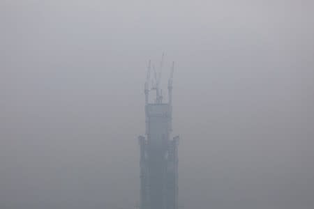 A view shows the city skyline shrouded by haze in Kuala Lumpur