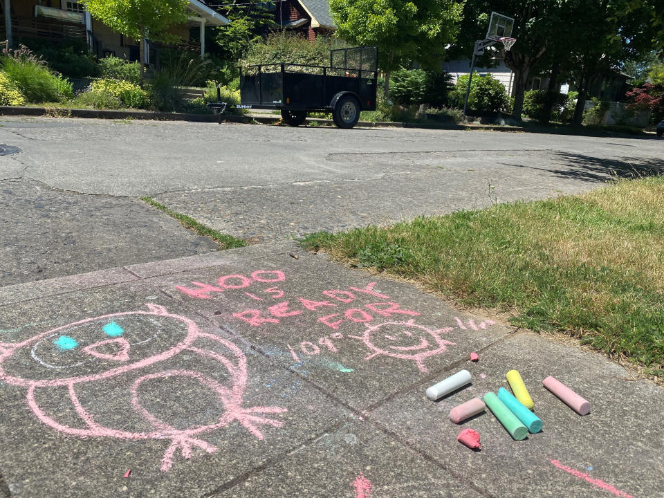 A chalk drawing on the sidewalk in a residential neighborhood in Southeast Portland, Ore., Friday, June 25, 2021, represents a funny take on how hot the temperature is supposed to be during the weekend. The Pacific Northwest sweltered Friday as a historic heat wave hit Washington and Oregon, with temperatures in many areas expected to top out 25 to 30 degrees above normal in the coming days. (AP Photo/Sara Cline)