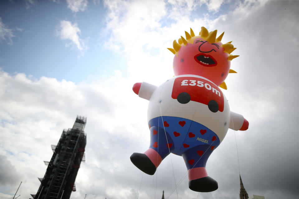 A blimp depicting Boris Johnson is launched in Parliament Square, London, ahead of a pro-European Union a march organised by March for Change.