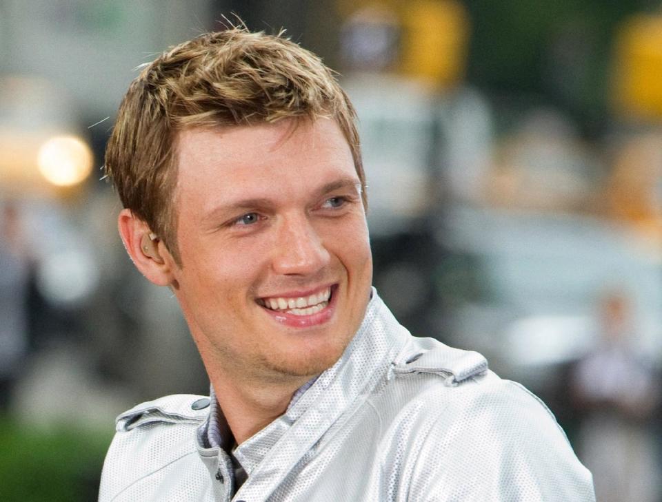 FILE - This May 24, 2010 file photo shows Nick Carter of the Backstreet Boys performing on CBS News' "The Early Show" in New York. The Backstreet Boys singer proposed to his fitness trainer girlfriend Lauren Kitt in February, and he says they may bring their marriage to the small screen. “There have been offers and opportunities to film the actually wedding, like a TV show,” the 33-year-old said in a recent interview. The couple appears together in a series of fitness webisodes called “Kit Fitt.” (AP Photo/Charles Sykes, file)