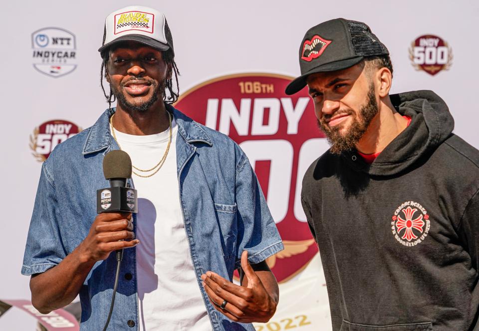 Former Indiana Pacer, Justin Holiday, left, and Indiana Pacers Guard, Duane Washington Jr. walk the red carpet during the 106th running of the Indianapolis 500 at Indianapolis Motor Speedway.