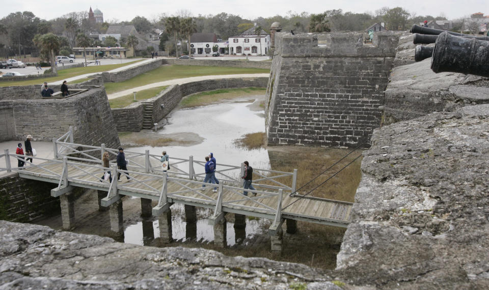 FILE - This Feb. 4, 2005 file photo shows visitors exploring the Castillo de San Marcos in St. Augustine, Fla. The nation's oldest fort was built by Spanish settlers between 1672 and 1695 and used to fight off pirates, hostile natives, French, British, and South Carolinian forces. This year Florida is marking the 500th Anniversary since the explorer Ponce de Leon landed in Florida in April 1513, with a series of events related to the state's Spanish heritage and other aspects of its history. (AP Photo/Amy Sancetta, file)